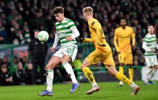 Matt O'Riley in action for Celtic, February 2022