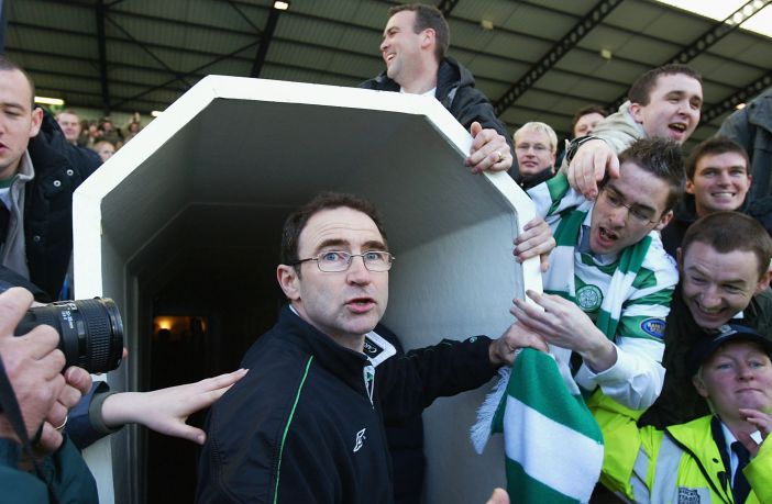 Celtic manager Martin O'Neill is mobbed by supporters