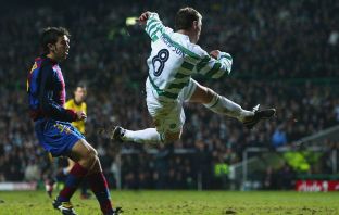 Alan Thompson of Celtic scores