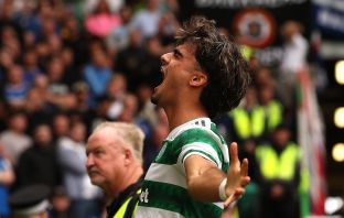 Jota of Celtic celebrates