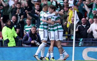 Matt O'Riley celebrates