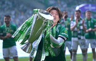 Kyogo with the trophy