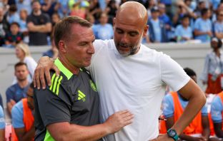 Celtic manager Brendan Rodgers meets with Manchester City manager Pep Guardiola