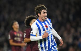 Matt O'Riley celebrates