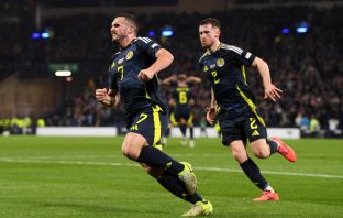 John McGinn and Anthony Ralston celebrate