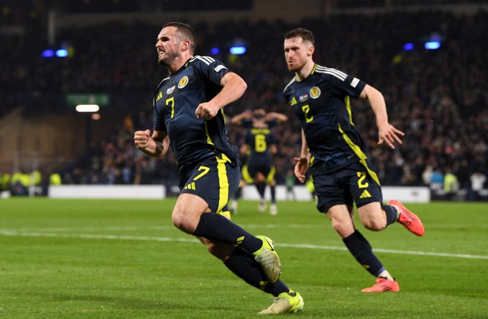 John McGinn and Anthony Ralston celebrate