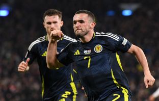 John McGinn and Anthony Ralston celebrate