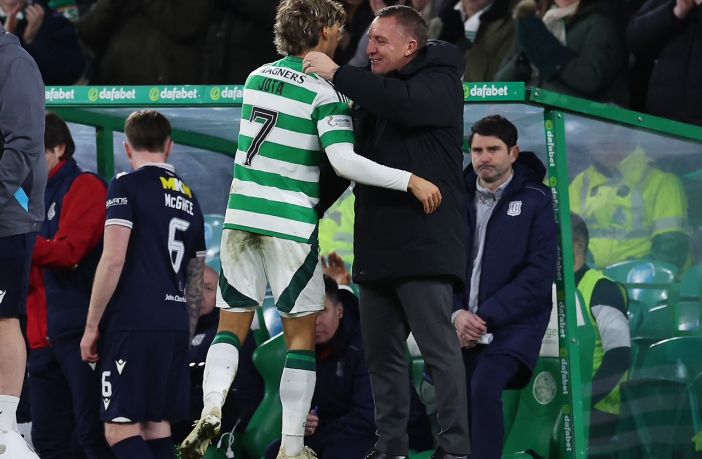 Jota embraces Brendan Rodgers