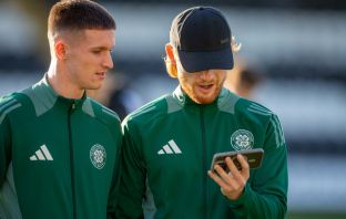 Johnny Kenny and Liam Scales checking the results
