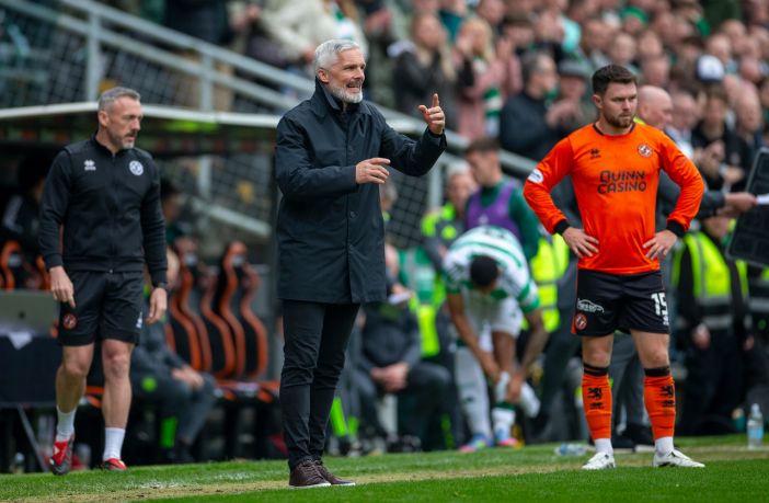 Jim Goodwin looks on