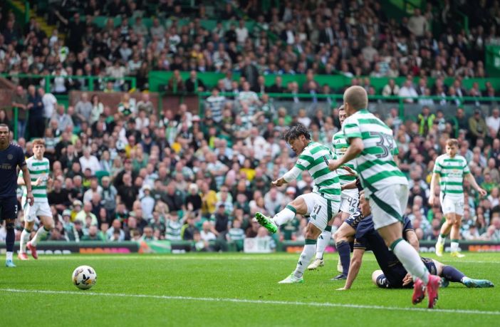 Reo Hatate of Celtic scores