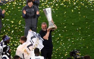 Ange Postecoglou lifts the Europa League Trophy