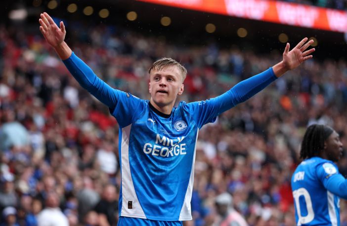 Harley Mills of Peterborough United celebrates