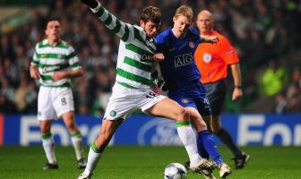 Massimo Donati of Celtic battles for the ball with Darren Fletcher of Manchester United