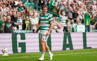 Luke McCowan of Celtic celebrates