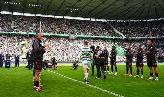 Callum McGregor delivers the trophy