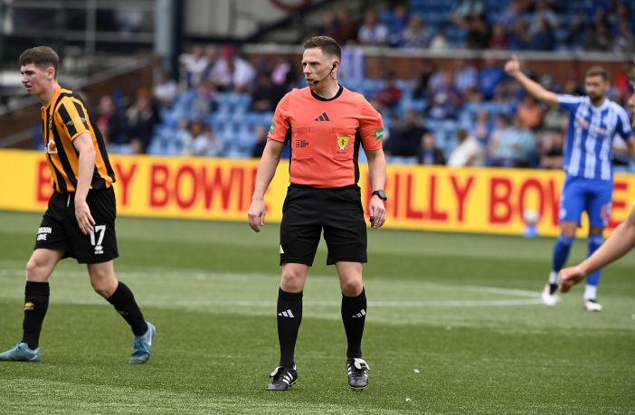 Match referee Lloyd Wilson