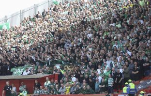The Celtic support at Pittodrie