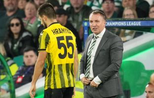 Celtic Manager Brendan Rodgers exchanges words with Valeri Gromyko of Kairat Almaty