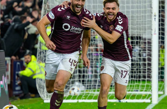 Craig Halkett of Hearts celebrates with Alan Forrest