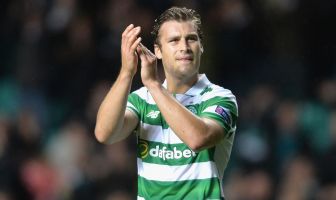 Erik Sviatchenko of Celtic applauds the fans