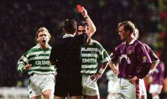 30/11/96 - CELTIC V HEARTS (2-2) Paolo Di Canio is ushered from the field by manager Tommy Burns (right) after receiving a red card following an altercation with Hearts midfielder Steve Fulton. Photo The Celtic Wiki