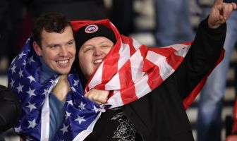 Scotland fans wrapped in a USA flag