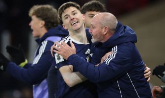 Kieran Tierney celebrates with Steve Clarke