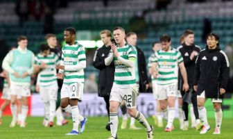 Callum McGregor of Celtic applauds the fans