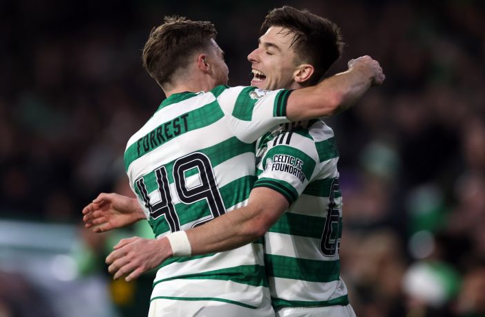 Kieran Tierney and James Forrest celebrate