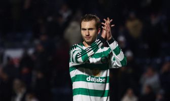 Benjamin Nygren of Celtic applauds the fans