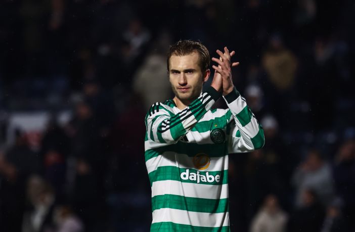 Benjamin Nygren of Celtic applauds the fans