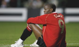 Louis Saha of Manchester United looks dejected