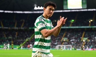 Yang of Celtic applauds the crowd