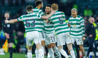 Alex Oxlaide-Chamberlain celebrates
