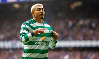 Julian Araujo holds the Celtic badge