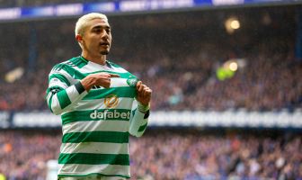 Julian Araujo holds the Celtic badge
