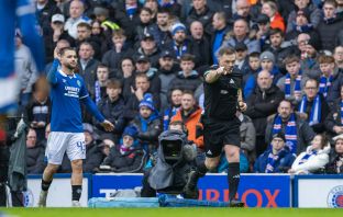 John Beaton points to the spot after a VAR review.