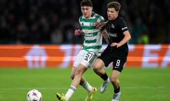Colby Donovan of Celtic battles for possession with Filip Rozga of Sturm Graz
