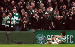 Yang celebrates scoring Celtic's third goal against Motherwell
