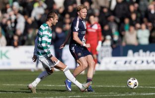Luke Graham of Dundee and Benjamin Nygren of Celtic