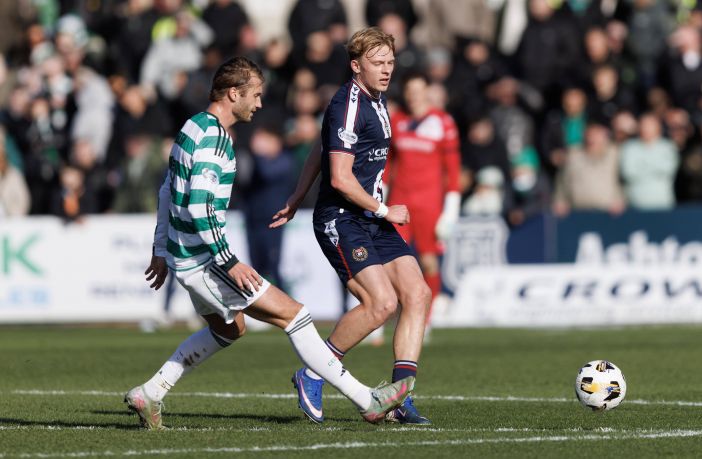 Luke Graham of Dundee and Benjamin Nygren of Celtic