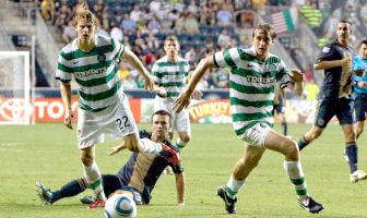 Celtic FC defenders Glenn Loovens ( 22) Milan Misun ( 15)